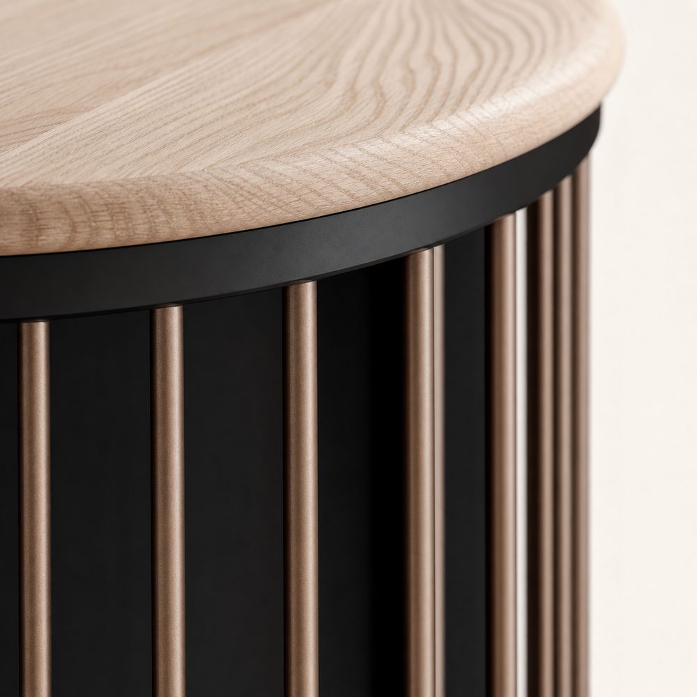 Macro view of the Denn oak top, matte black rail, and bronze rods meeting at the curved corner