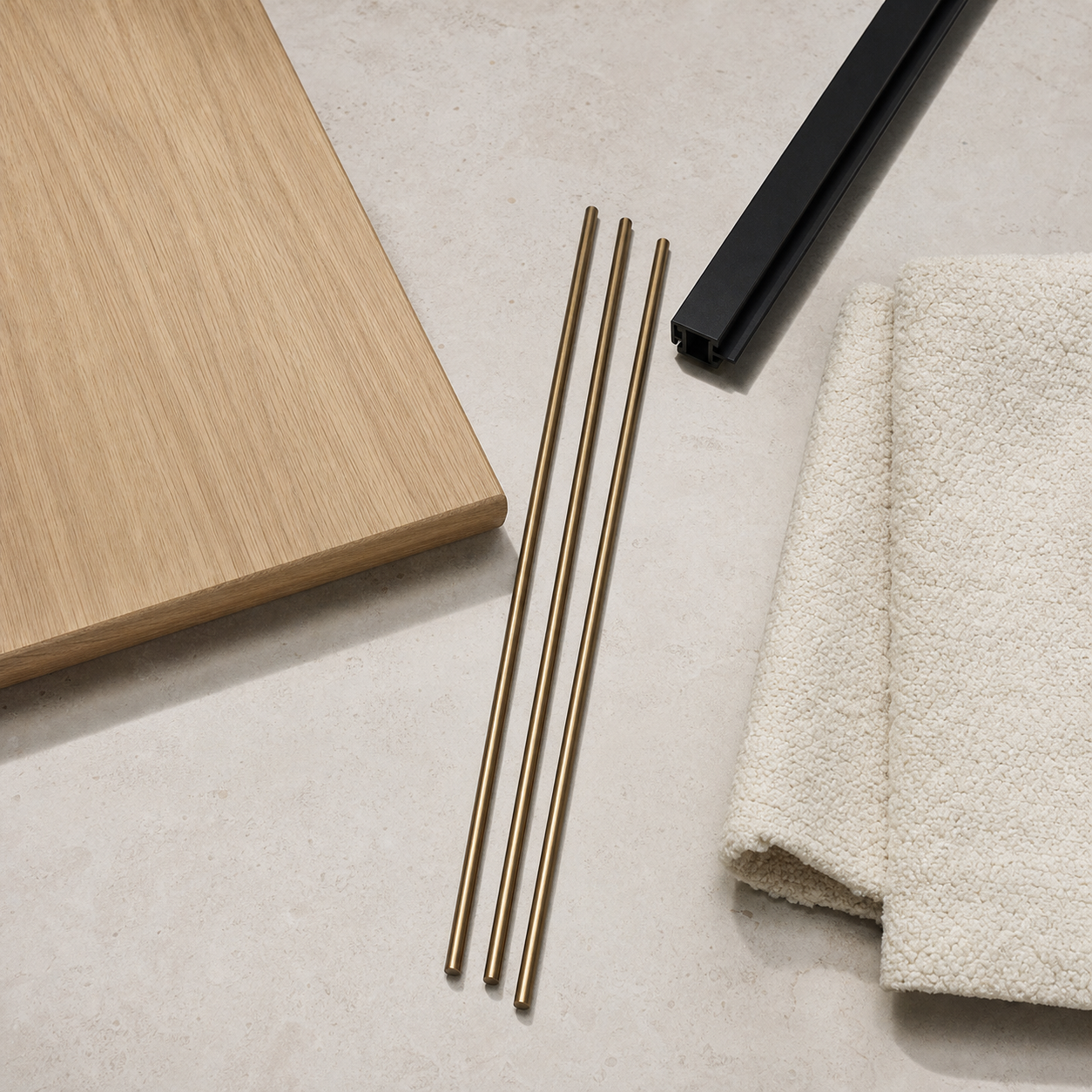 Koja material study with oak, bronze, black aluminum, and cream textile